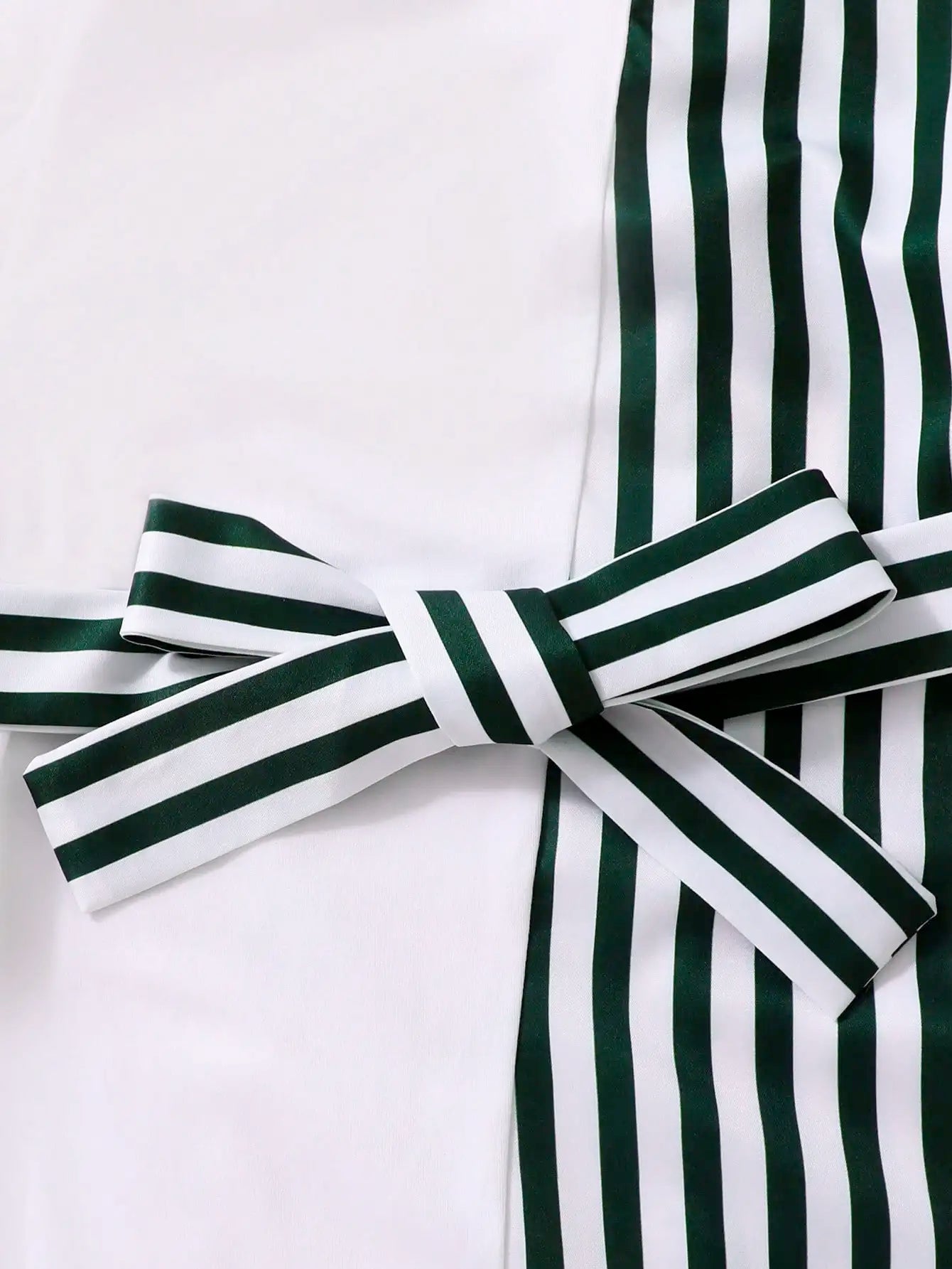 Girls black and white striped dress: stylish belt design, elegant bow decoration