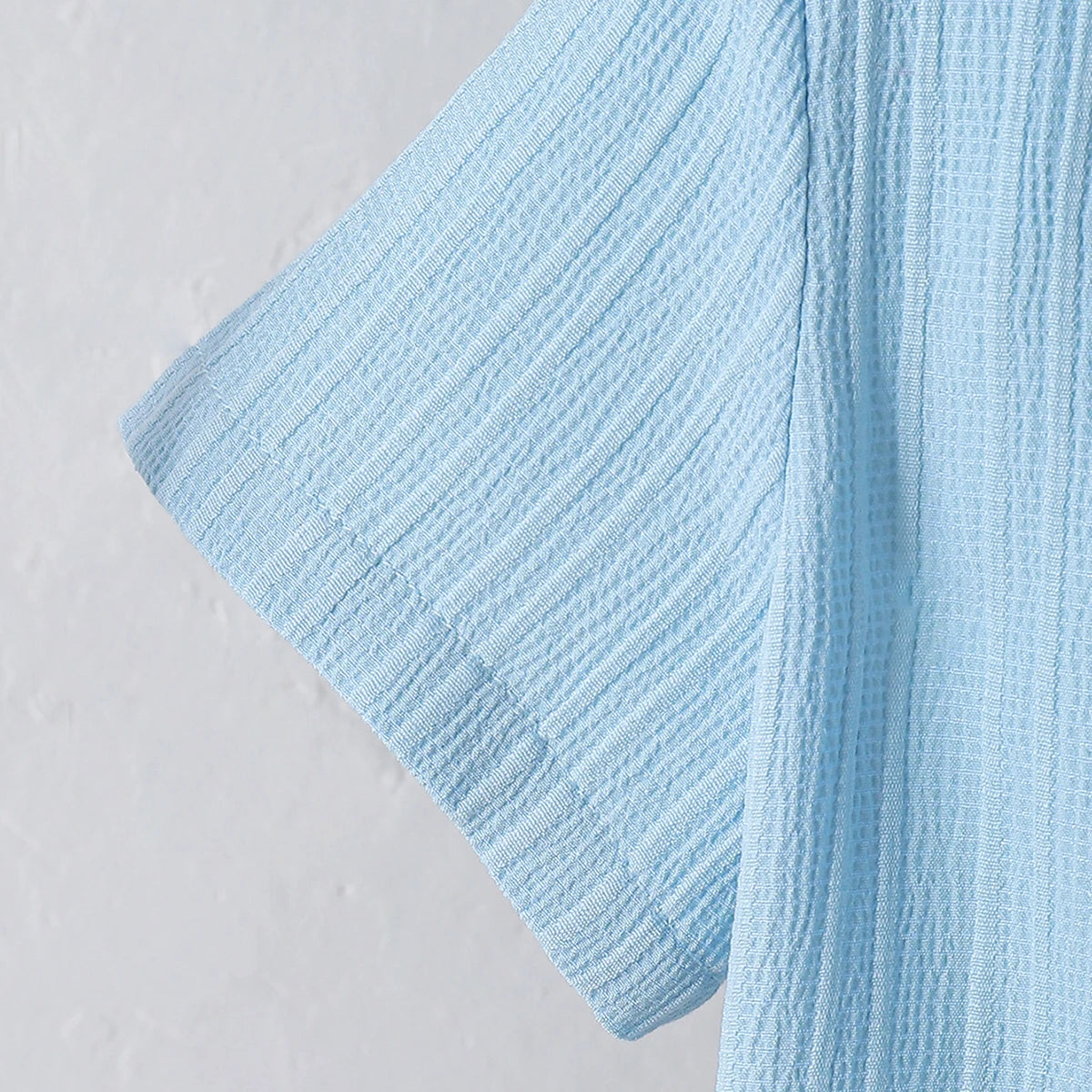 New summer men's short-sleeved woven pure blue button pocket + loose shorts two-piece set